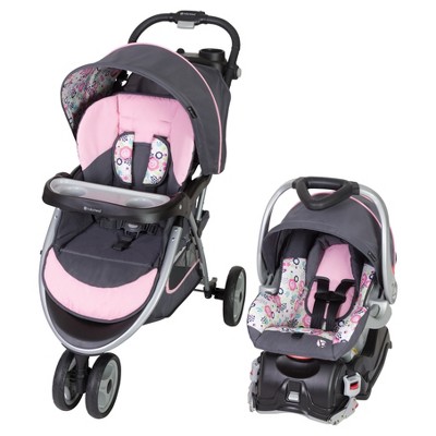 newborn girl carseat and stroller