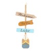 Wooden Paddle Novelty Canoe Oar Sign Wall Decor with Arrow and Stripe Patterns Multi Colored - Olivia & May - 4 of 4