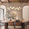 Rennnsan Zephivon 44"W 12-Light Bubble Linear Frosted Glass Modern Dimmable Kitchen Island Pendant in Gold - 2 of 4