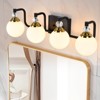PAKOKULA 4-Light Black and Gold Vanity Light with Globe White Frosted Glass Shade - 2 of 4
