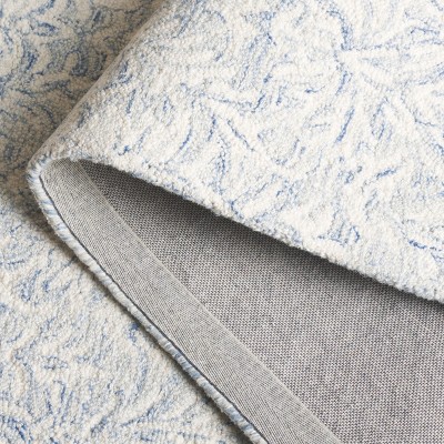 Ivory and Blue Hand-Tufted Wool Floral Rug