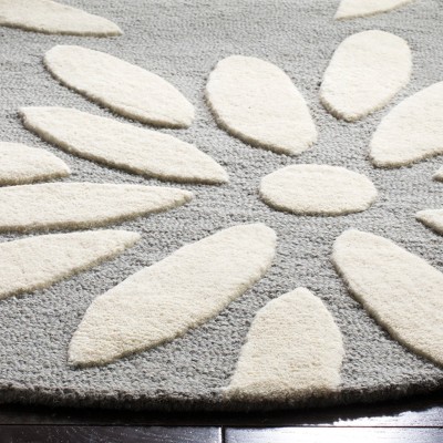 Handmade Ivory Wool Round Tufted Kids Rug