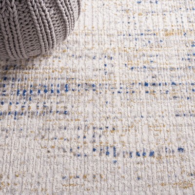 Beige and Blue Abstract Synthetic Area Rug