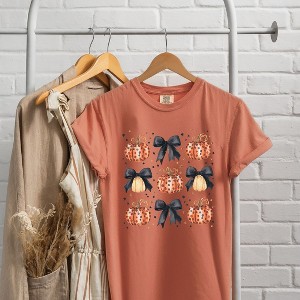 Simply Sage Market Women's Coquette Black Bow Pumpkin Chart Short Sleeve Garment Dyed Tee - 1 of 4