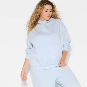 Women's Oversized Bubble Hem Hooded Sweatshirt - Wild Fable™ - 1 of 3