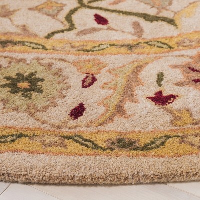 Ivory Round Handmade Wool Tufted Area Rug