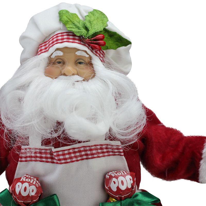 Northlight 12" Santa Claus Holding a Garland with Tootsie Candies Christmas Decoration, 3 of 6