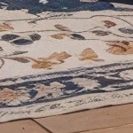 beige cushion/gray wicker