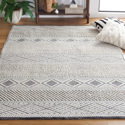 Handmade Black and Ivory Wool Area Rug 3' x 5'