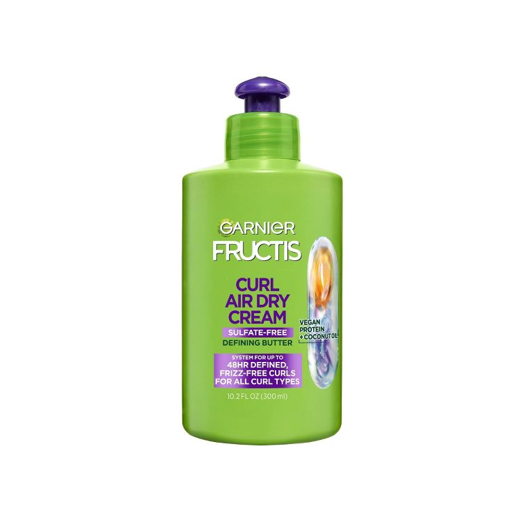 Green colored bottle of Garnier Fructis Curl Air Dry Cream with purple pump, labeled as sulfate-free and 10.2 fl oz (300 ml).