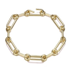 14K Gold Link Chain Bracelet, featuring a classic and elegant design with interconnected links that add a touch of sophistication to any look. - 1 of 3