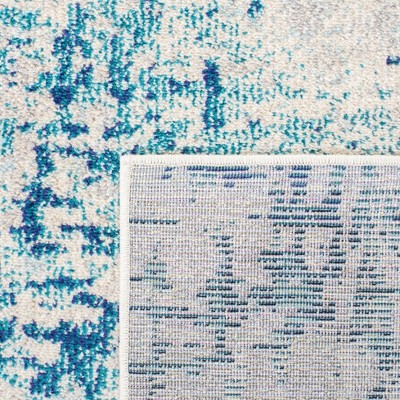Ivory and Turquoise Square Abstract Synthetic Area Rug