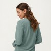 Anna-Kaci Women's Long Sleeve Eyelet Embroidered Top with V-Neckline and Ruffle Cuffs - 3 of 4