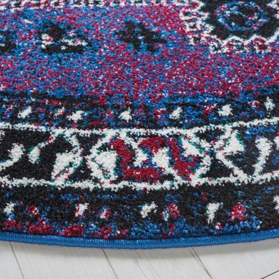 Handmade Round Purple and Black Synthetic Area Rug