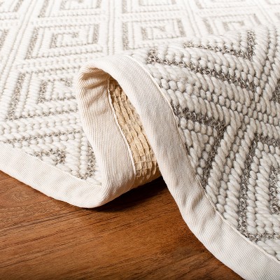 Ivory Geometric Hand-Knotted Wool and Synthetic Rug, 5'x8'