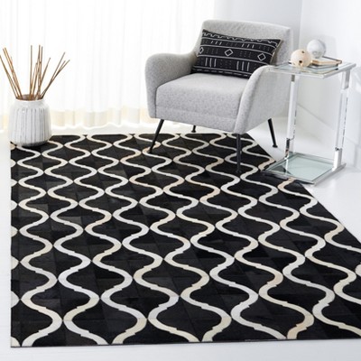 Hand-Knotted Black and Beige Geometric Cowhide Rug