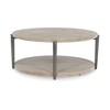 Signature Design by Ashley Dyonton Round Coffee Table with Wheels, Light Grayish Brown - 3 of 4