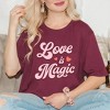 Simply Sage Market Women's Love Is Magic Short Sleeve Graphic Tee - 2 of 4