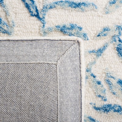 Ivory and Blue Floral Hand-Tufted Wool Area Rug, 5' x 8'