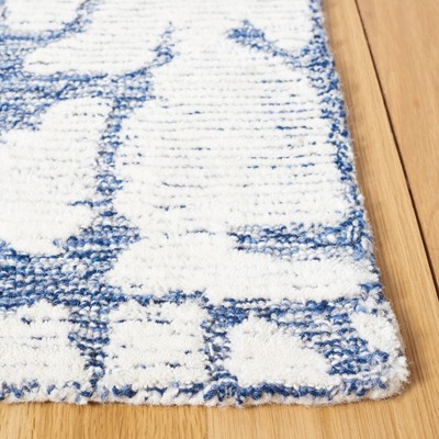 Handmade Blue and Ivory Wool Tufted 4' x 6' Rug