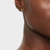 14K Gold Plated Cubic Zirconia Huggie Hoop Earrings - A New Day™: Clip-In Clasp, Nickel-Free, Gift Box Included - 2 of 4