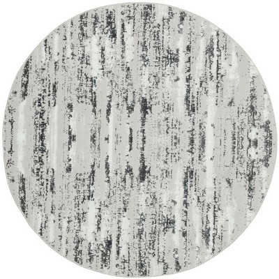 HomeRoots 4' Black and Off White Round Abstract Washable Non Skid Area Rug