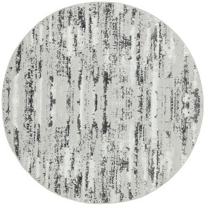 HomeRoots 4' Black and Off White Round Abstract Washable Non Skid Area Rug - 1 of 4
