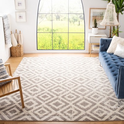 Elegant Ivory Synthetic 54" Round Hand-Knotted Area Rug