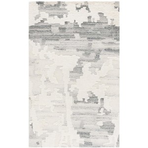 Casablanca CSB444 Hand Tufted Indoor Rugs - Safavieh - 1 of 4