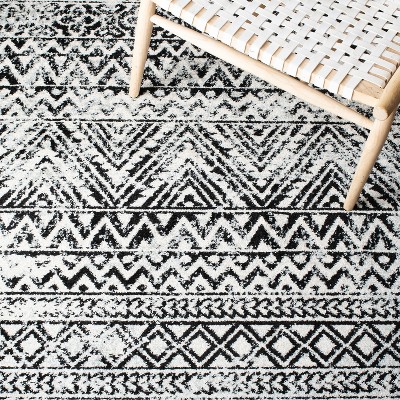 Ivory and Charcoal Geometric 9' x 12' Synthetic Area Rug