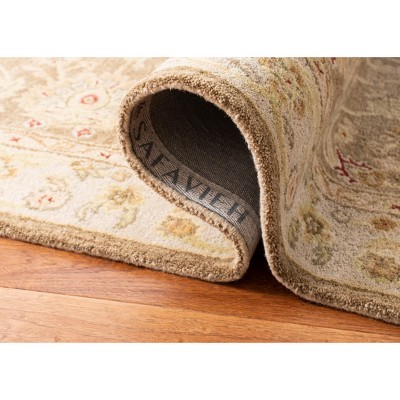 Handmade Tan and Ivory Wool Tufted Area Rug