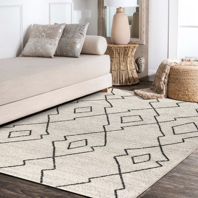Cream and Black Geometric Synthetic 3' x 5' Area Rug