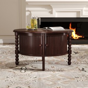 Zeus & Ruta 30.3" Round Mid-Century Coffee Table with Sliding Door Storage for Small Living Spaces - 1 of 4