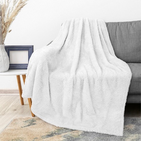 White fur sofa online throw