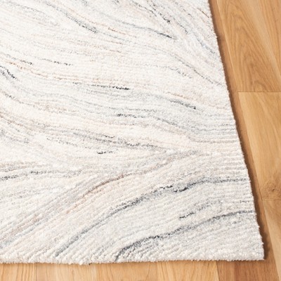 Ivory Elegance 4' x 6' Hand-Tufted Wool Area Rug