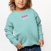 The Juniper Shop Embroidered Be Kind Turning Smiles Toddler Graphic Sweatshirt - 2 of 3