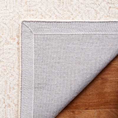 Ivory Hand Tufted Wool Rectangular 8' x 10' Area Rug