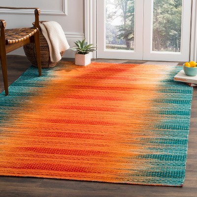 Handmade Teal and Red Wool 5' x 8' Flat Woven Area Rug