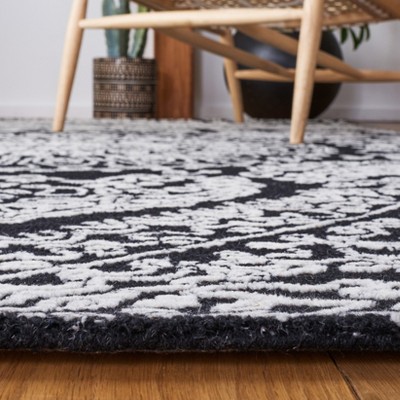 Elegant Midnight Bloom Hand-Tufted Wool Rug in Black and Ivory - 5' x 8'