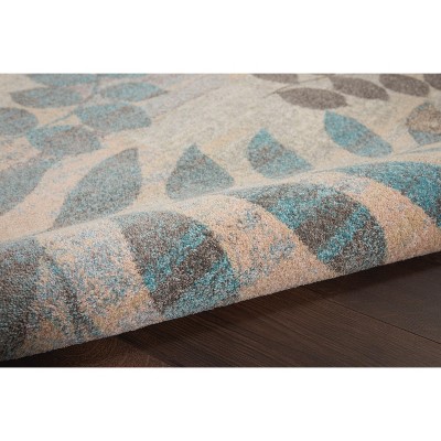 Ivory and Light Blue Floral Synthetic 5' x 7' Area Rug