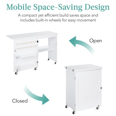 Compact White Sewing & Craft Table with Storage and Wheels