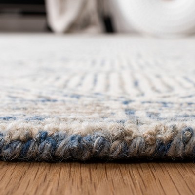 Handmade Ivory and Blue Wool Geometric Accent Rug 2' x 3'