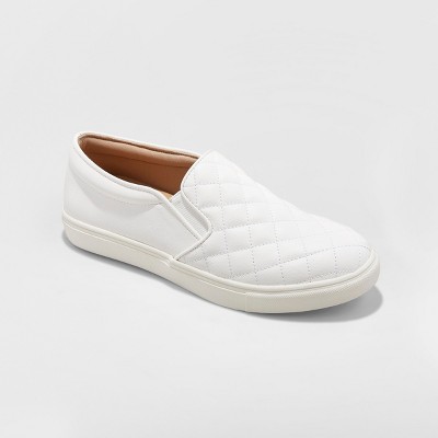 white quilted slip on shoes