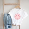 Simply Sage Market Women's Pink Checker Smiley Face Short Sleeve Graphic Tee - 2 of 2