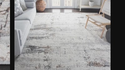 Ivory and Rust Synthetic 79" Reversible Round Rug