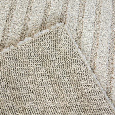 Cream Synthetic 5' x 7' Reversible Rectangular Rug