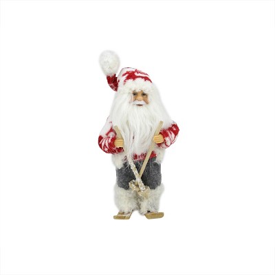 Northlight 9" Red and White Frontier Reindeer Skiing Santa Claus Christmas Figurine