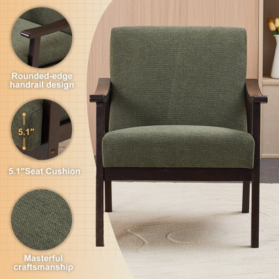 Close-up of green upholstered chair showing rounded-edge handrail design and seat cushion