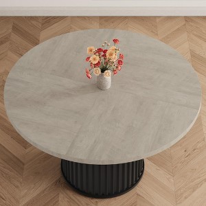 47" Round Dining Table, Seats 4–6 — Farmhouse Style with Sturdy Wavy Metal Pedestal Base for Kitchen or Dining RoomSeats - 1 of 4