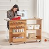 Folding Sewing Table with Storage Shelves, Trays, Pegs, Wheels, and Magnetic Doors, Compact Craft Desk for Home - 2 of 4